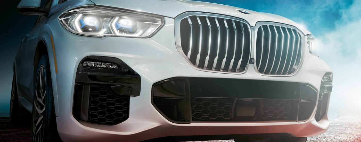A close up shows the grille on a white 2021 BMW X5.