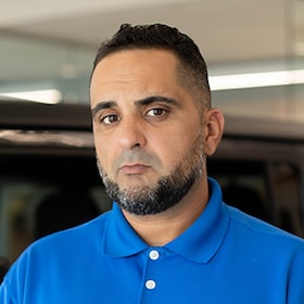 Staff member Nelson Baez from ID_0c66f9