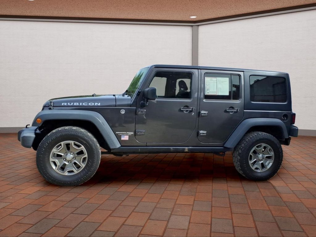 Used 2018 Jeep Wrangler JK Unlimited Rubicon with VIN 1C4BJWFG2JL912061 for sale in Hampshire, IL