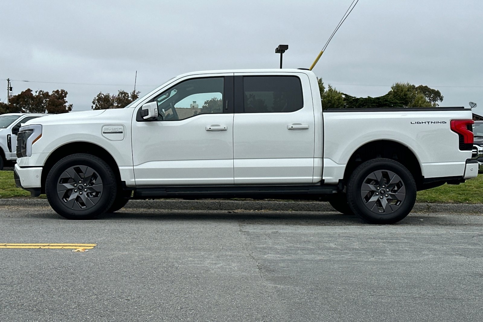 Used 2023 Ford F-150 Lightning Lariat with VIN 1FTVW1EL2PWG17954 for sale in Half Moon Bay, CA