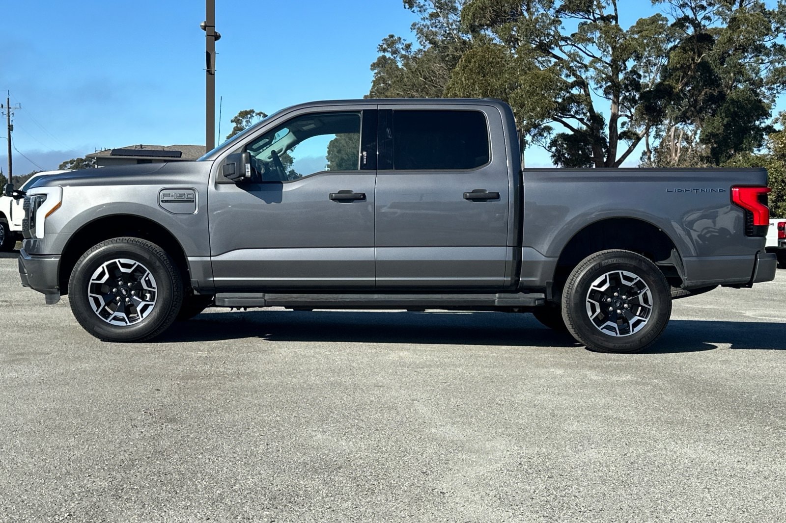 Used 2023 Ford F-150 Lightning XLT with VIN 1FTVW1EL9PWG58811 for sale in Half Moon Bay, CA