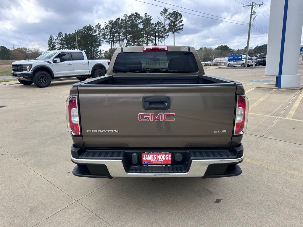Used 2015 GMC Canyon SLE with VIN 1GTG5BE39F1207164 for sale in Idabel, OK
