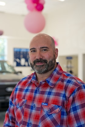 Staff member Flavio Luis from ID_697bb3f7d801