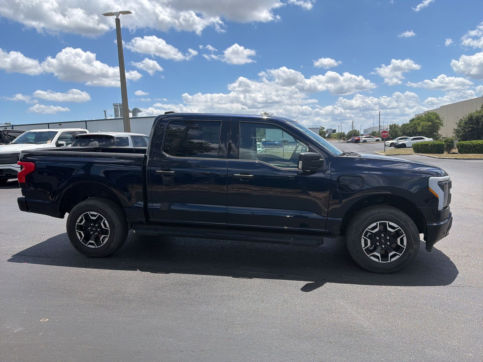 Used 2023 Ford F-150 Lightning XLT with VIN 1FTVW1EL8PWG02701 for sale in Davenport, FL