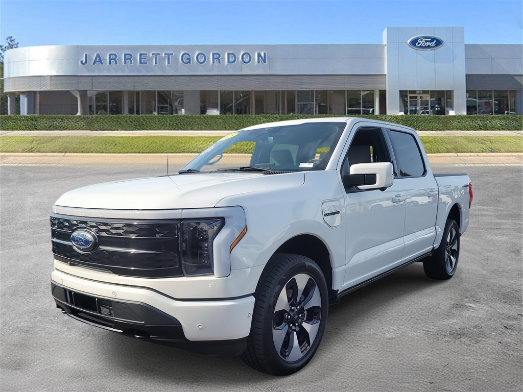 Used 2023 Ford F-150 Lightning Platinum with VIN 1FT6W1EVXPWG17058 for sale in Winter Haven, FL