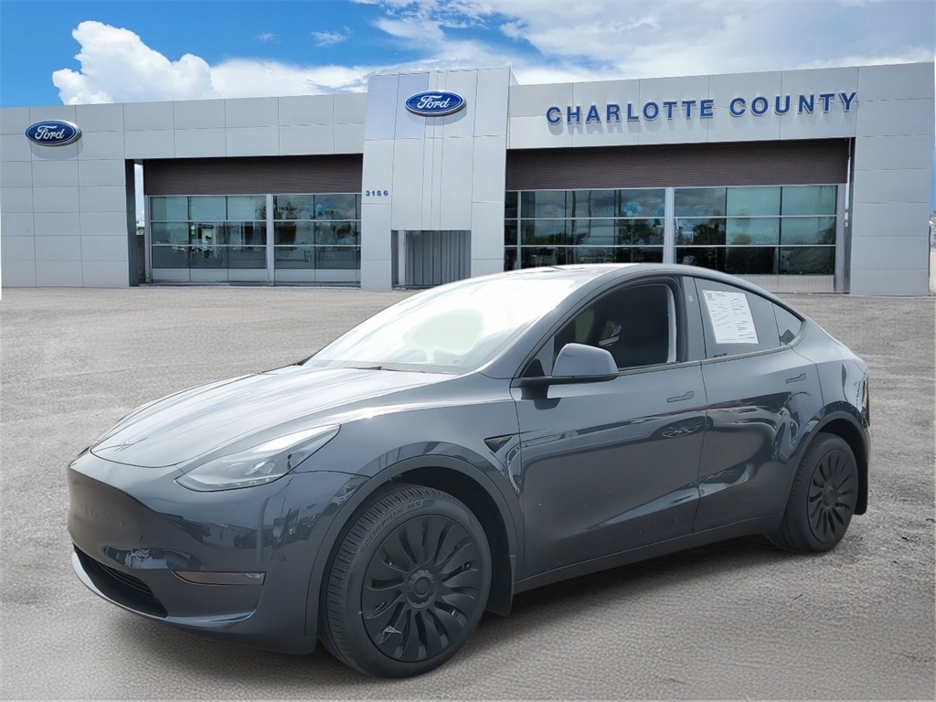 Used 2024 Tesla Model Y Long Range with VIN 7SAYGDEE6RA254210 for sale in Plant City, FL