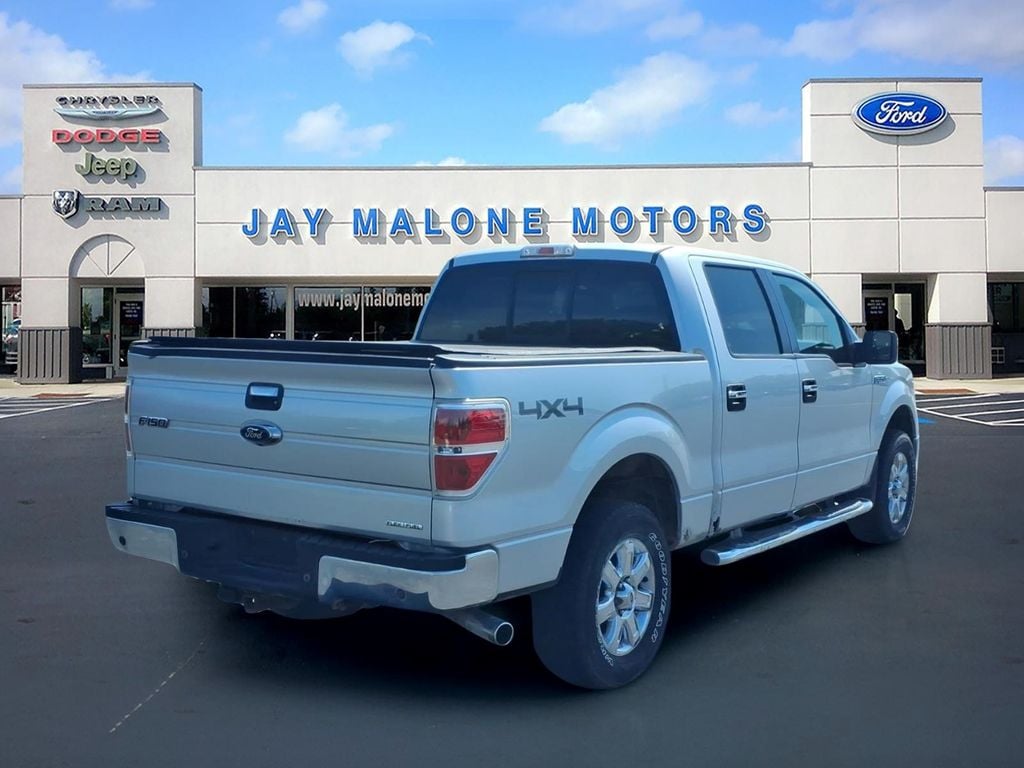 Used 2014 Ford F-150 XLT with VIN 1FTFW1EF0EFA30356 for sale in Hutchinson, Minnesota