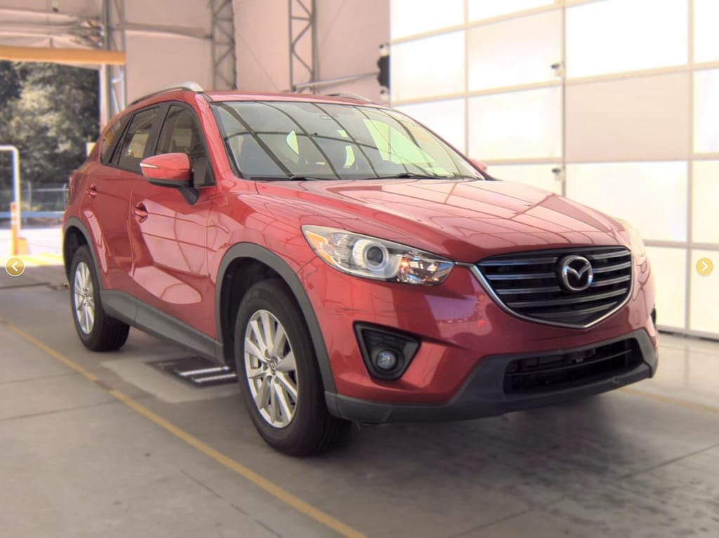Used 2016 Mazda CX-5 Sport with VIN JM3KE2BY0G0892924 for sale in Hutchinson, Minnesota