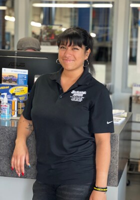 Staff member Nelly Aleman from ID_52858fe9b831