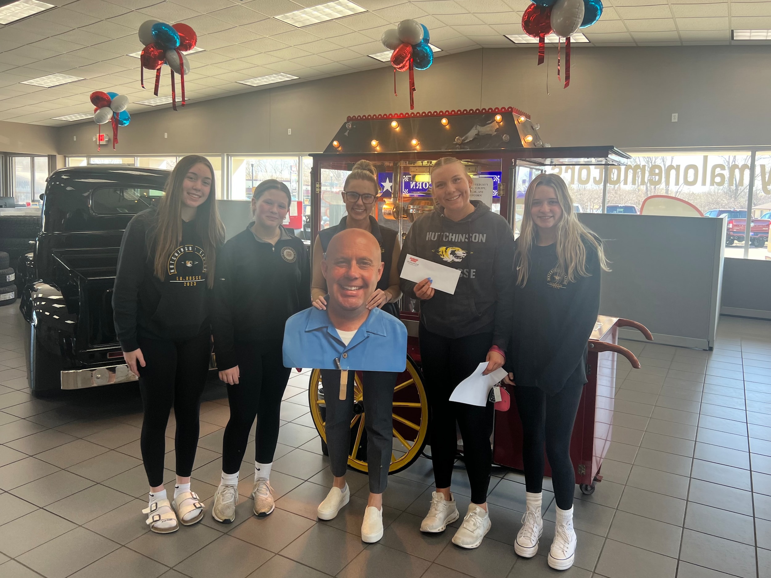 Jay Malone Motors — Donation to Local School Organization