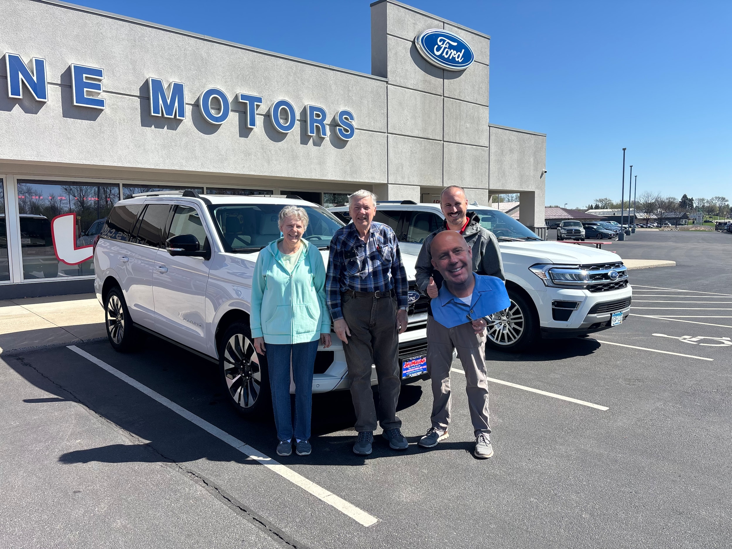 Happy Jay Malone Ford customer with their used Ford Expedition in Hutchinson MN