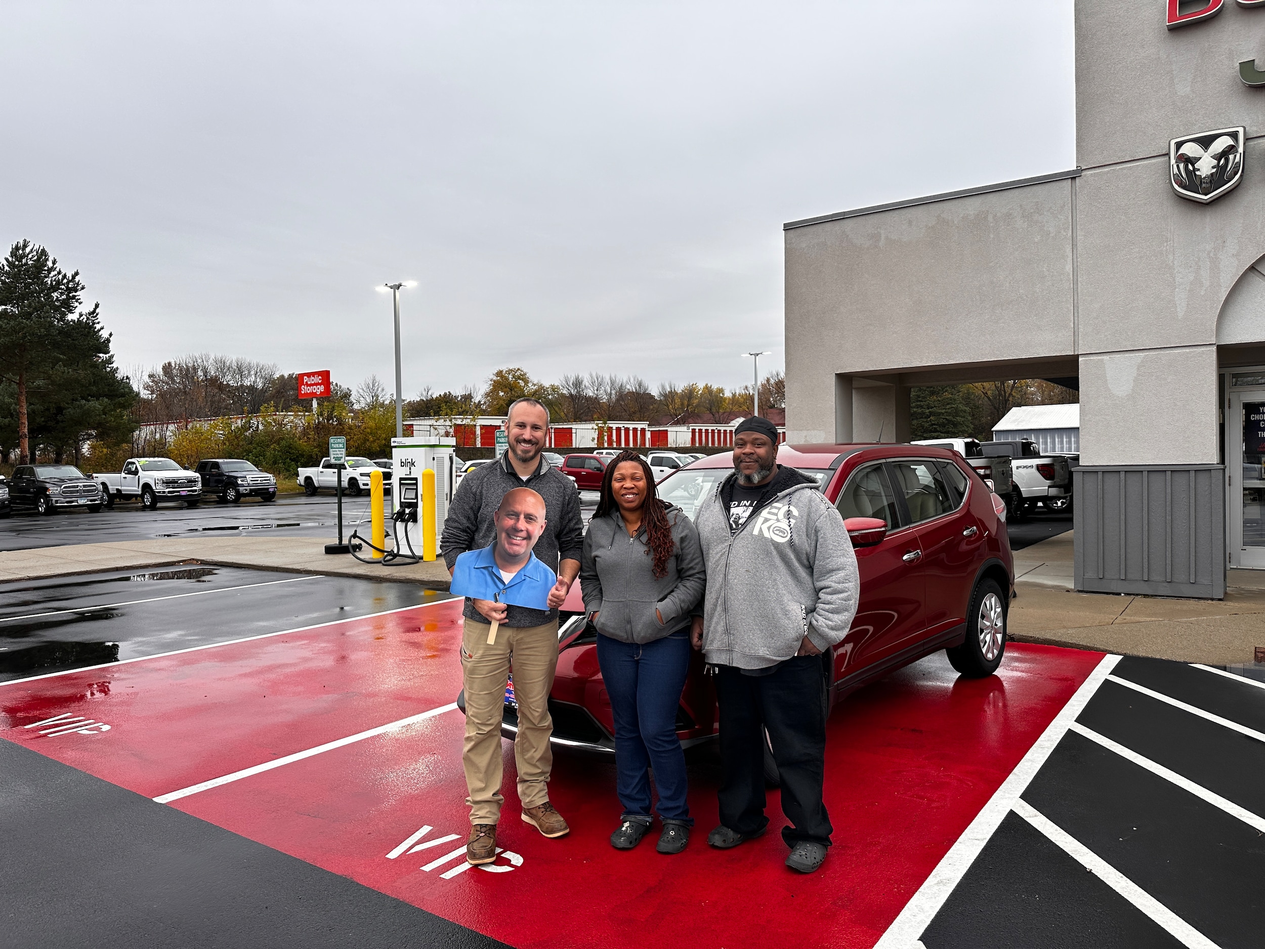 Customer with a used Nissan Rogue at Jay Malone CDJR in Hutchinson MN