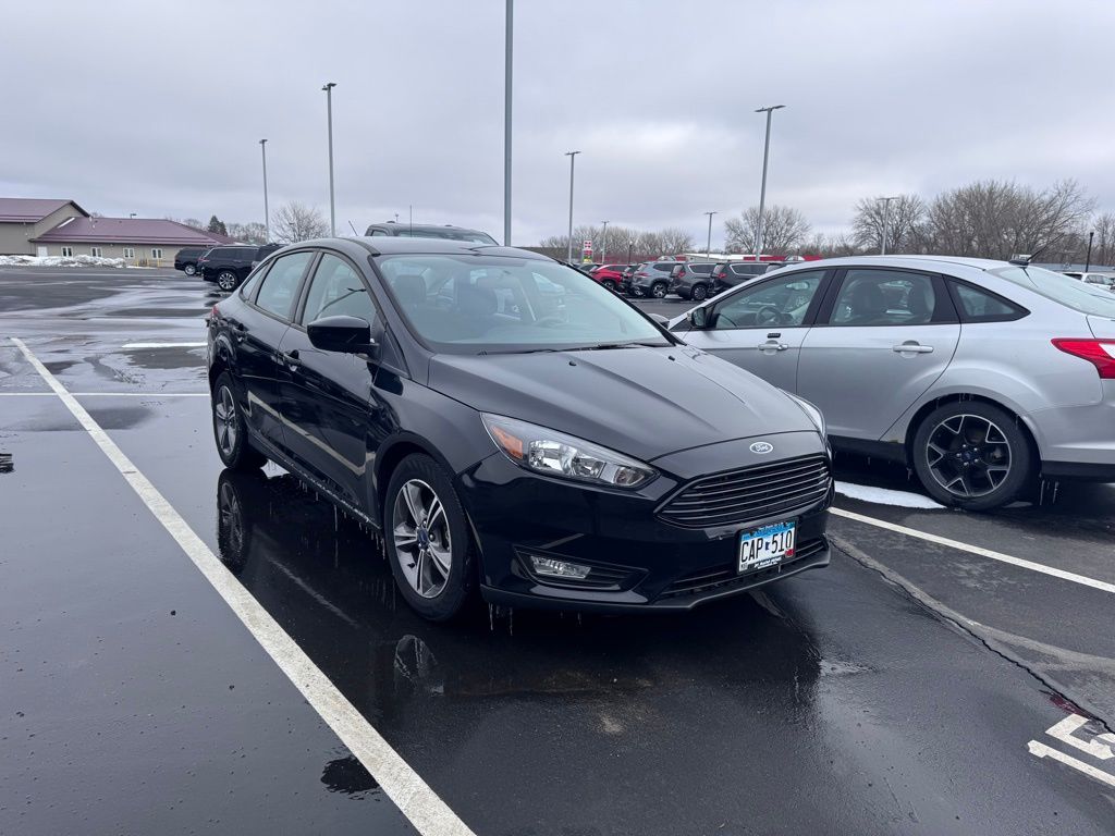 Used 2018 Ford Focus SE with VIN 1FADP3FE8JL217271 for sale in Hutchinson, Minnesota