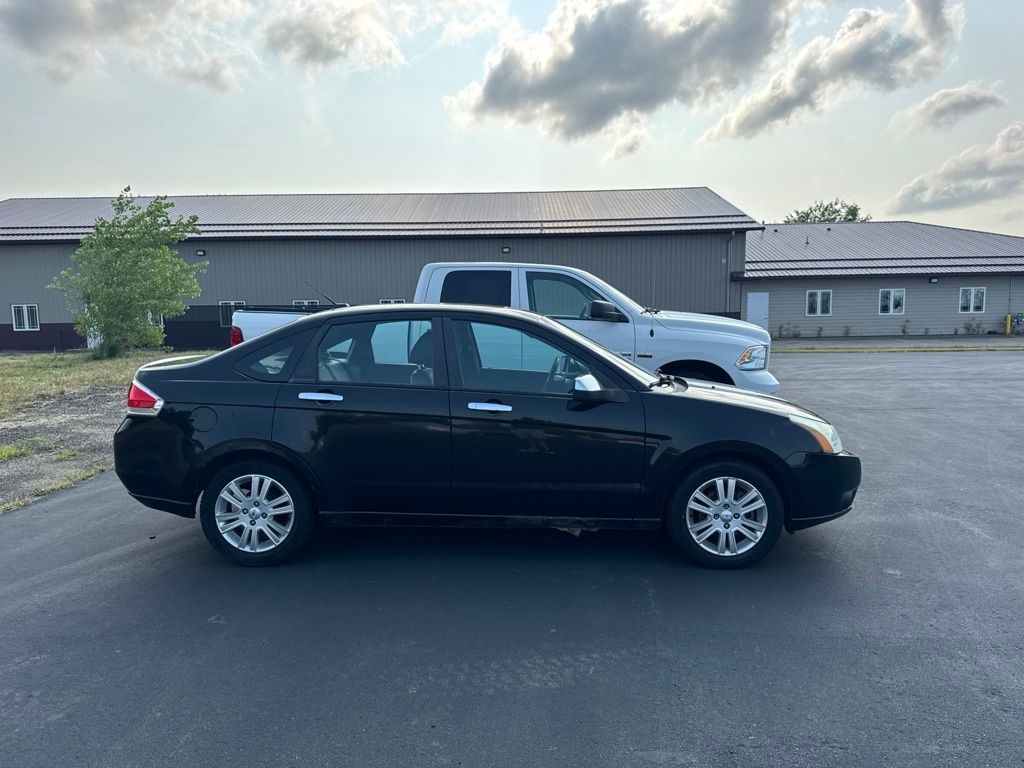 Used 2011 Ford Focus SEL with VIN 1FAHP3HN7BW127057 for sale in Hutchinson, Minnesota