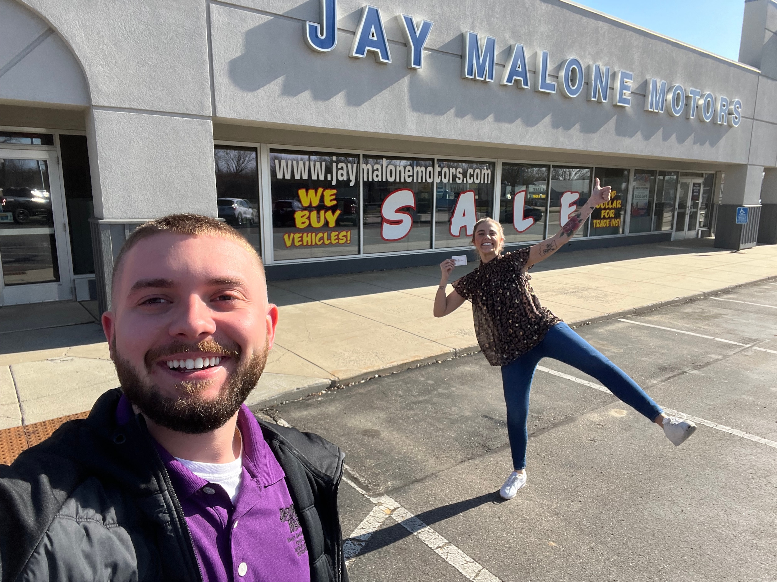 Jake Malone and Jordan Malone-Forst in front of Jay Malone Motors in Hutchinson, Minnesota