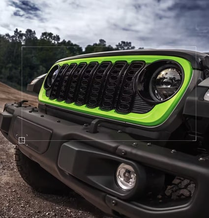 2027 Jeep Wrangler Switchback front end with Gecko green grille surround