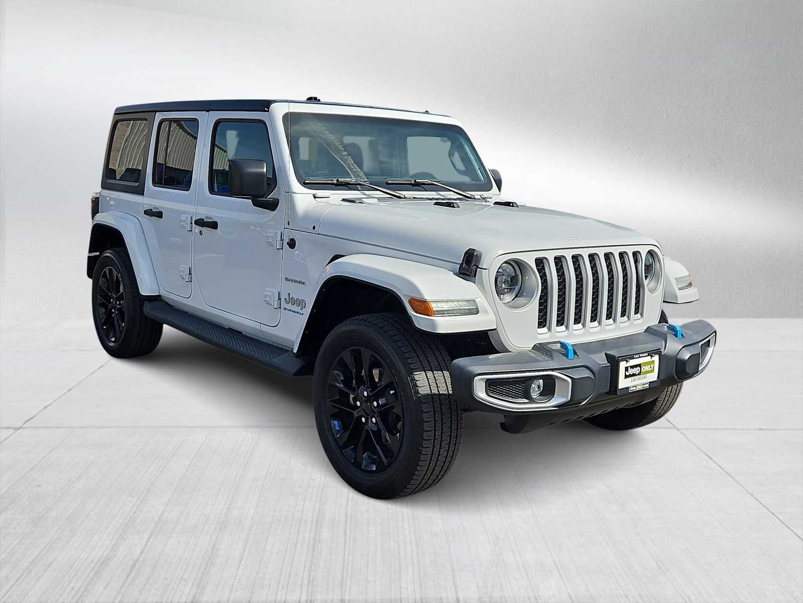 Used 2023 Jeep Wrangler 4xe Sahara 4XE with VIN 1C4JJXP64PW524828 for sale in Las Vegas, NV