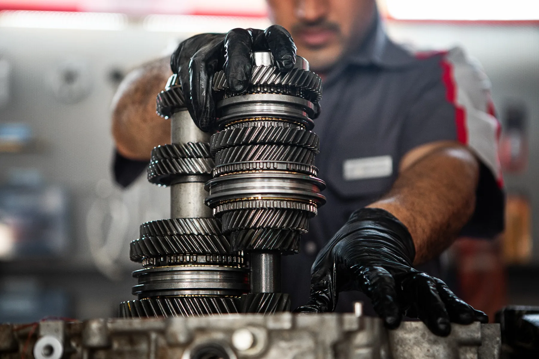 Jeep technician assembling transmission gears at a Las Vegas service center