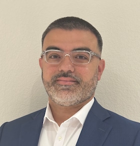 Staff member Genaro Leyva from ID_05080e51e24d