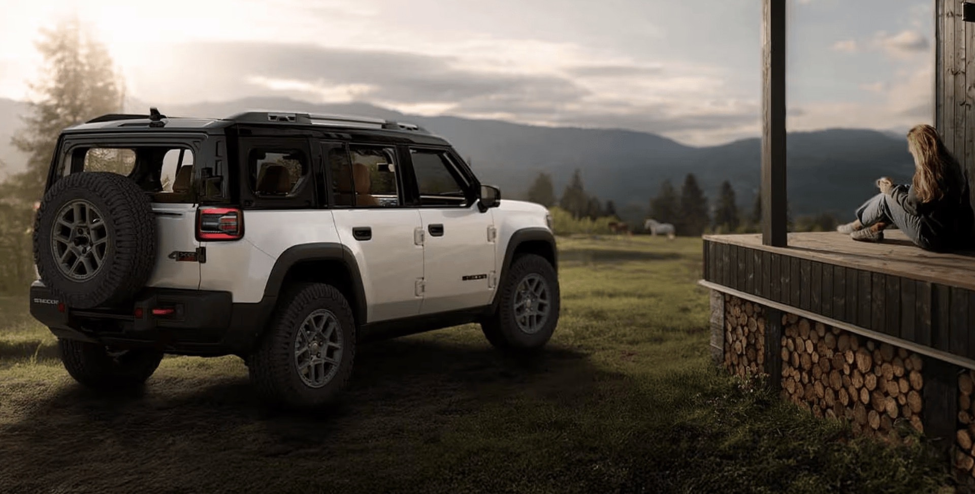 2026 Jeep Recon Moab three-quarter rear view with the swing gate and spare tire