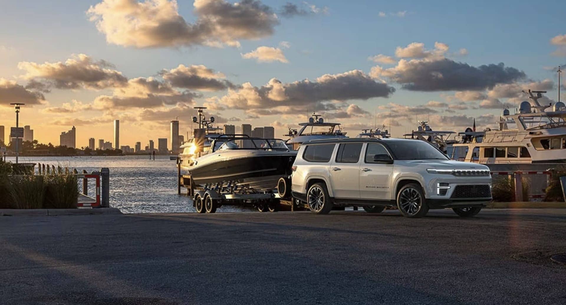 2026 Jeep Grand Wagoneer exterior, front three-quarter view on the road