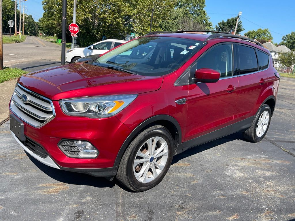Used 2018 Ford Escape SEL with VIN 1FMCU9HD7JUD25487 for sale in Coshocton, OH