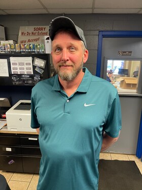 Staff member Adam Cameron from ID_ba7fcd9876e7