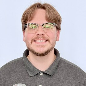 Staff member Jarrhett Grow from 515eab6b8aa4