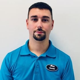 Staff member Travis Miller from e2761c06002e