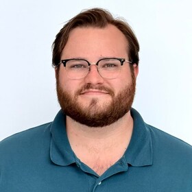 Staff member Aidan Keown from 3406a08ef61b