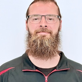 Staff member Cameron Beam from 3406a08ef61b