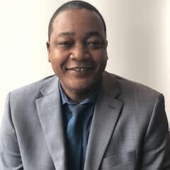 Staff member Mario McIntosh from 7282cf7530de