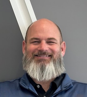 Staff member Nick Brown from ID_546407dc404c