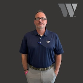 Staff member Tim Cox from ID_99662df9d891