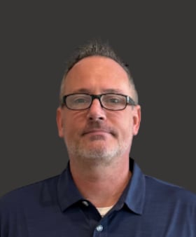 Staff member Tim Cox from ID_99662df9d891