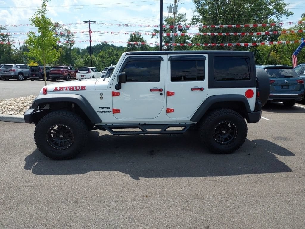 Used 2016 Jeep Wrangler Unlimited Sport S with VIN 1C4BJWDG4GL258918 for sale in Batavia, OH