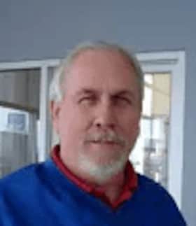 Staff member John Long from ID_f71326b428e6