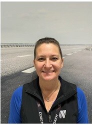 Staff member Gina McDougal from ID_3ff962216361