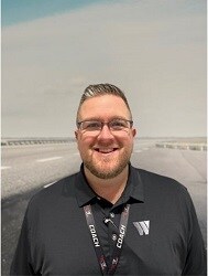 Staff member Alex Murdock from ID_32541f19ed60