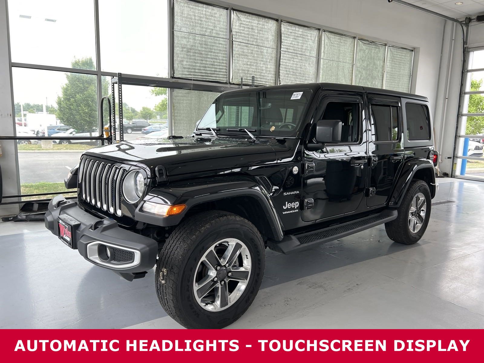 Used 2023 Jeep Wrangler 4-Door Sahara with VIN 1C4HJXEG2PW595598 for sale in Canal Winchester, OH