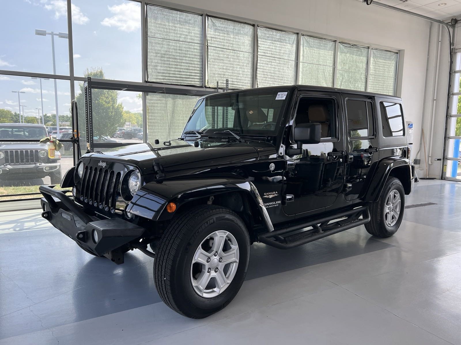 Used 2014 Jeep Wrangler Unlimited Sahara with VIN 1C4BJWEG0EL209422 for sale in Canal Winchester, OH