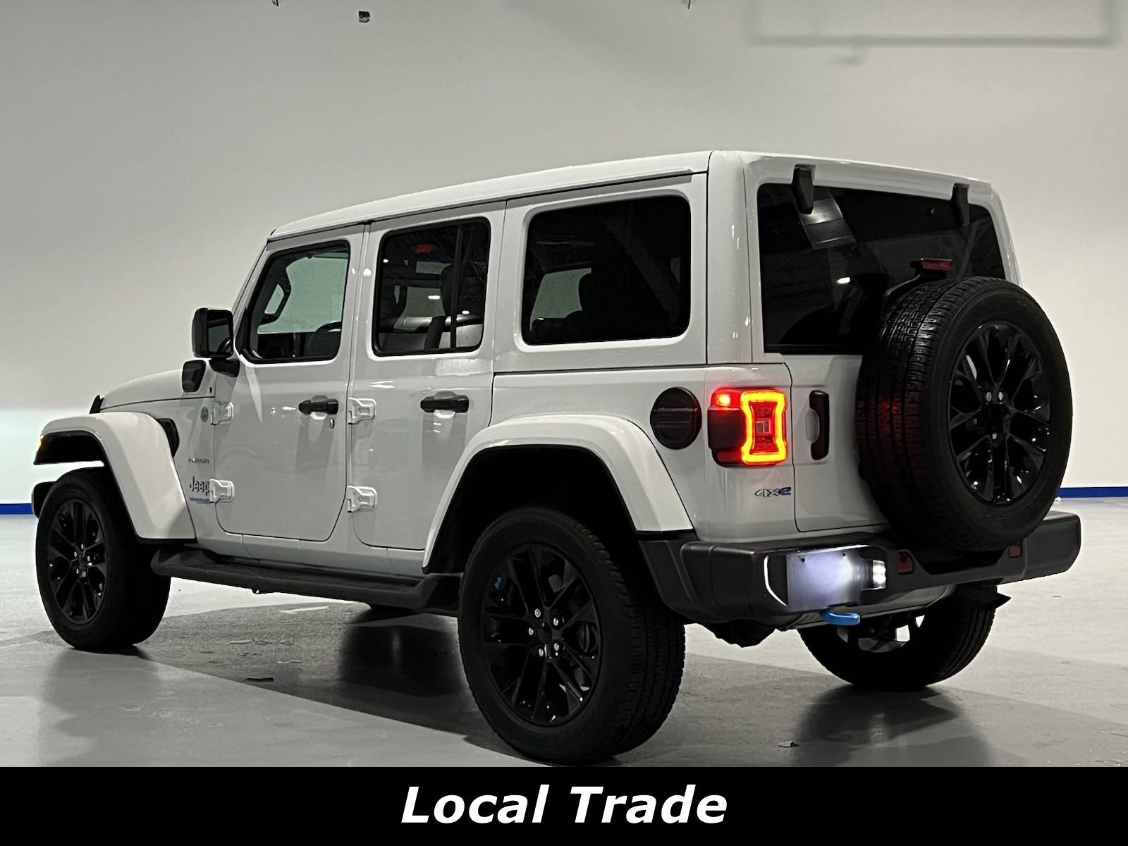 Used 2022 Jeep Wrangler Unlimited Sahara 4XE with VIN 1C4JJXP6XNW227768 for sale in Louisville, KY