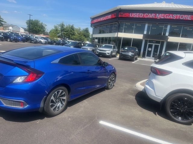 Used 2016 Honda Civic LX-P with VIN 2HGFC4B0XGH306037 for sale in Batavia, OH