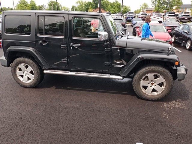 Used 2011 Jeep Wrangler Unlimited Sahara with VIN 1J4BA5H16BL552632 for sale in Batavia, OH