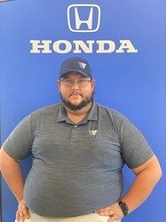 Staff member Joseph Roman from ID_6a776fcc1913