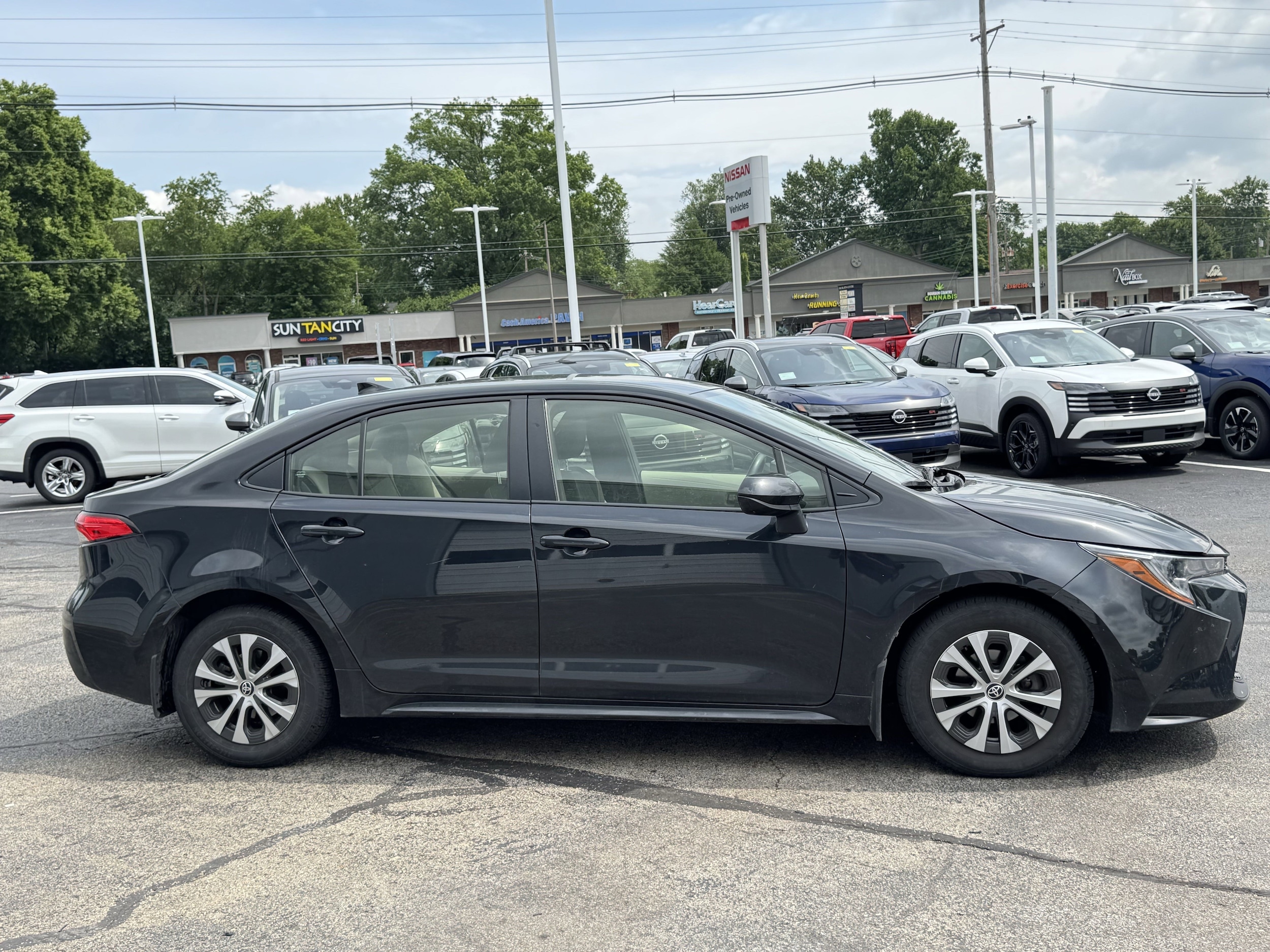 Used 2022 Toyota Corolla LE with VIN JTDEAMDE1NJ059933 for sale in Northfield, Minnesota