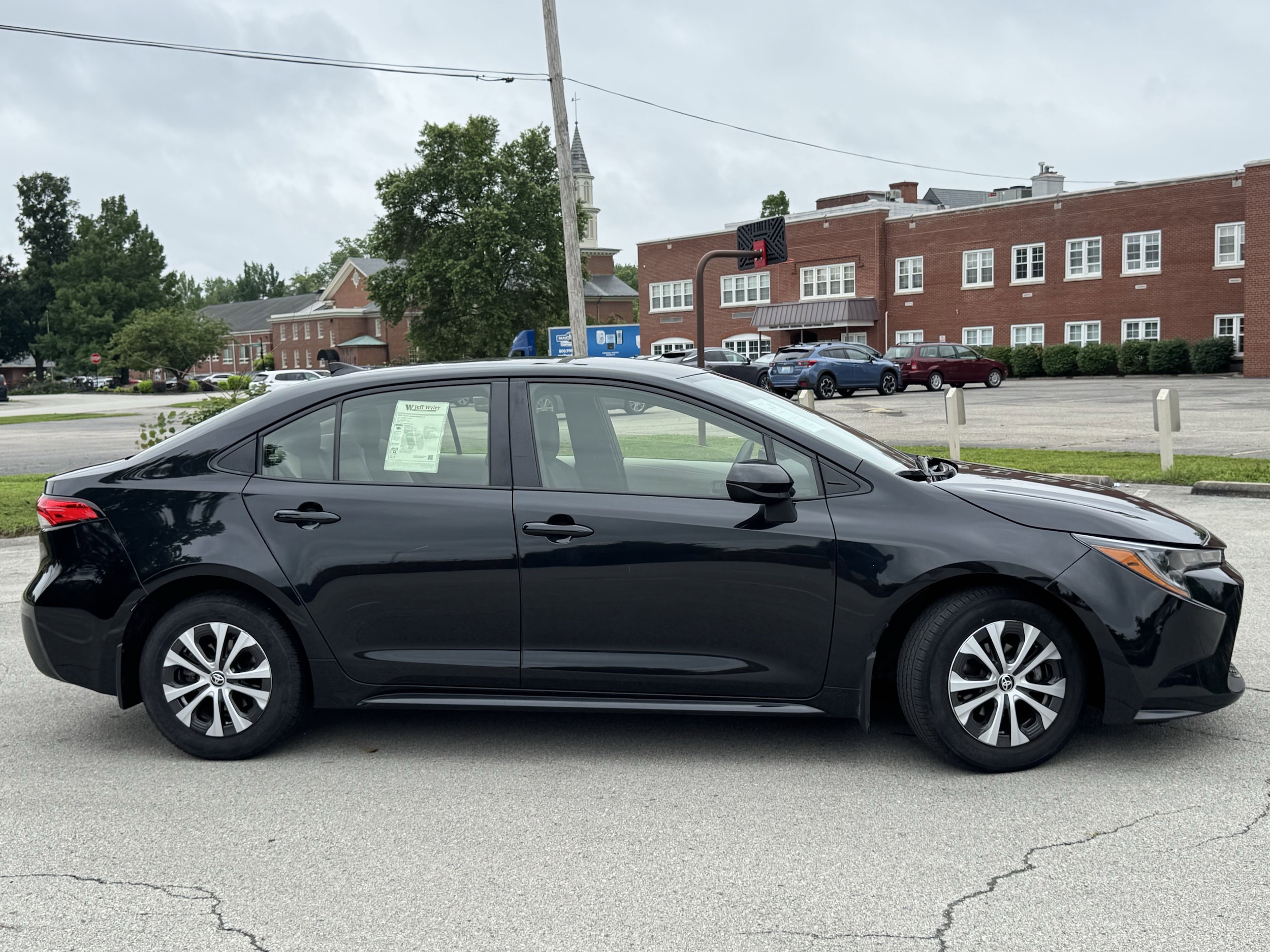 Used 2022 Toyota Corolla LE with VIN JTDEAMDE1NJ059933 for sale in Northfield, Minnesota