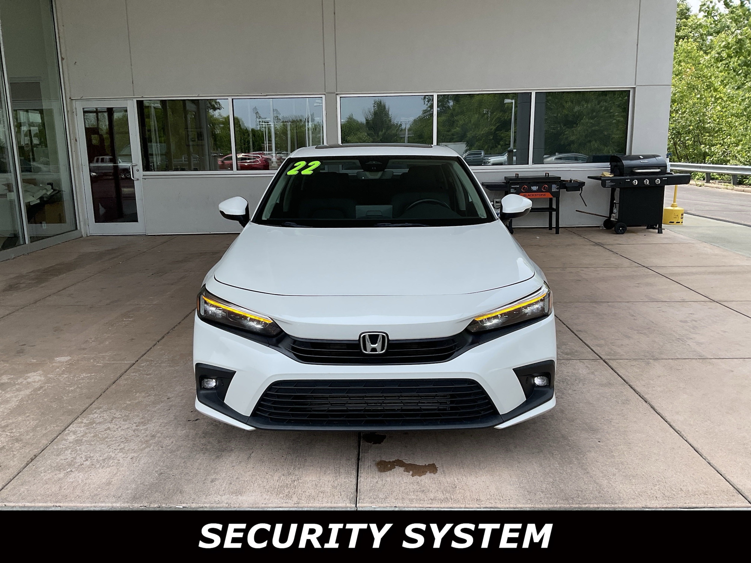 Used 2022 Honda Civic Touring with VIN 2HGFE1F99NH310997 for sale in Springfield, OH
