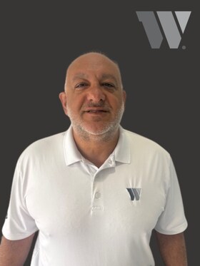 Staff member Sam Kassem from ID_a06ef7f9e128