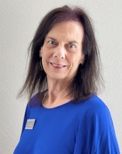 Staff member Miki Cooney from ID_e018d8039ba6